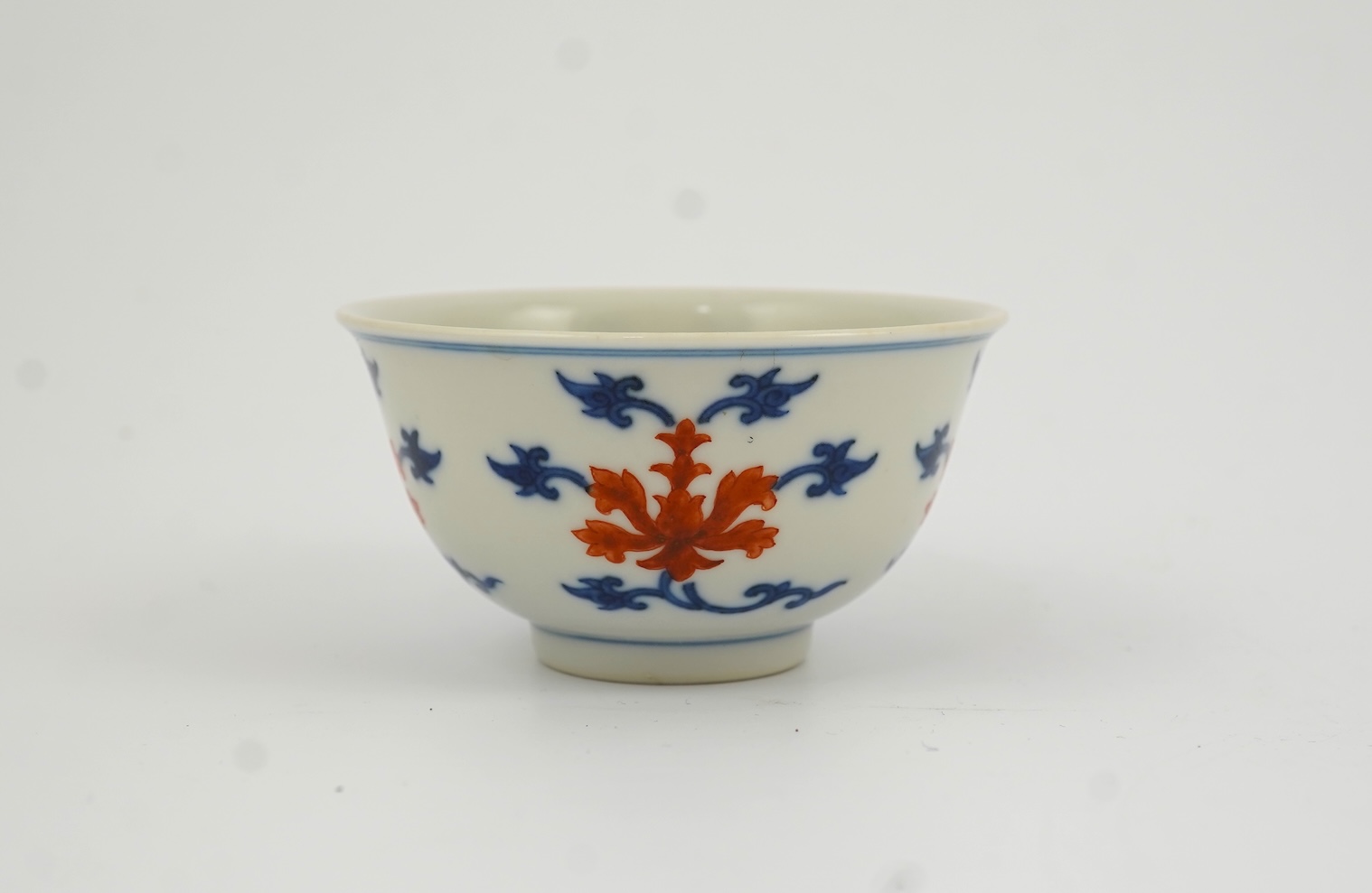 A Chinese underglaze blue and iron red bowl, Daoguang seal mark and possibly of the period